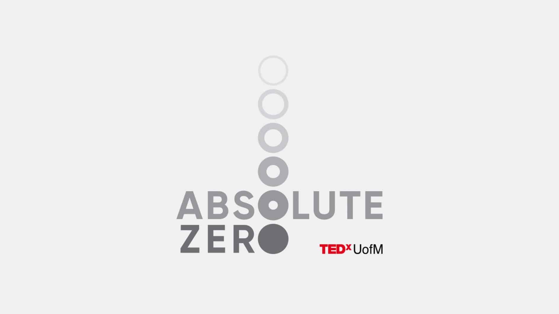 Logo with gradient circles forming a downward arrow above the words 'Absolute Zero' in grey. 'TEDxUofM' appears in red at the bottom right.