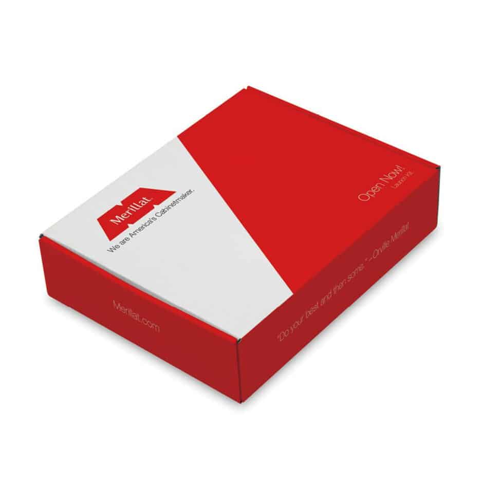 Rectangular box with a red and white design, featuring the text "Merillat" and "Open Now!" in white. The tone is professional and inviting.