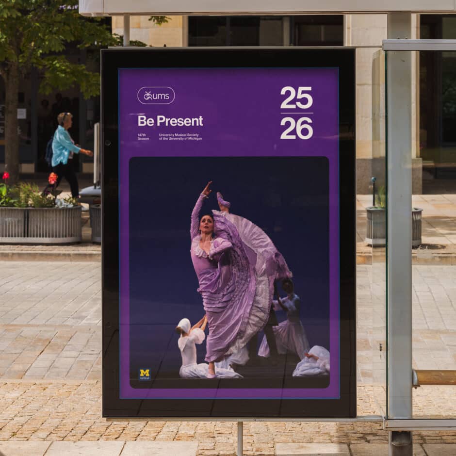 A vibrant poster with a dancer in a flowing purple dress, performing gracefully. Text reads "Be Present" by UMS, University of Michigan, 2025-2026 season.