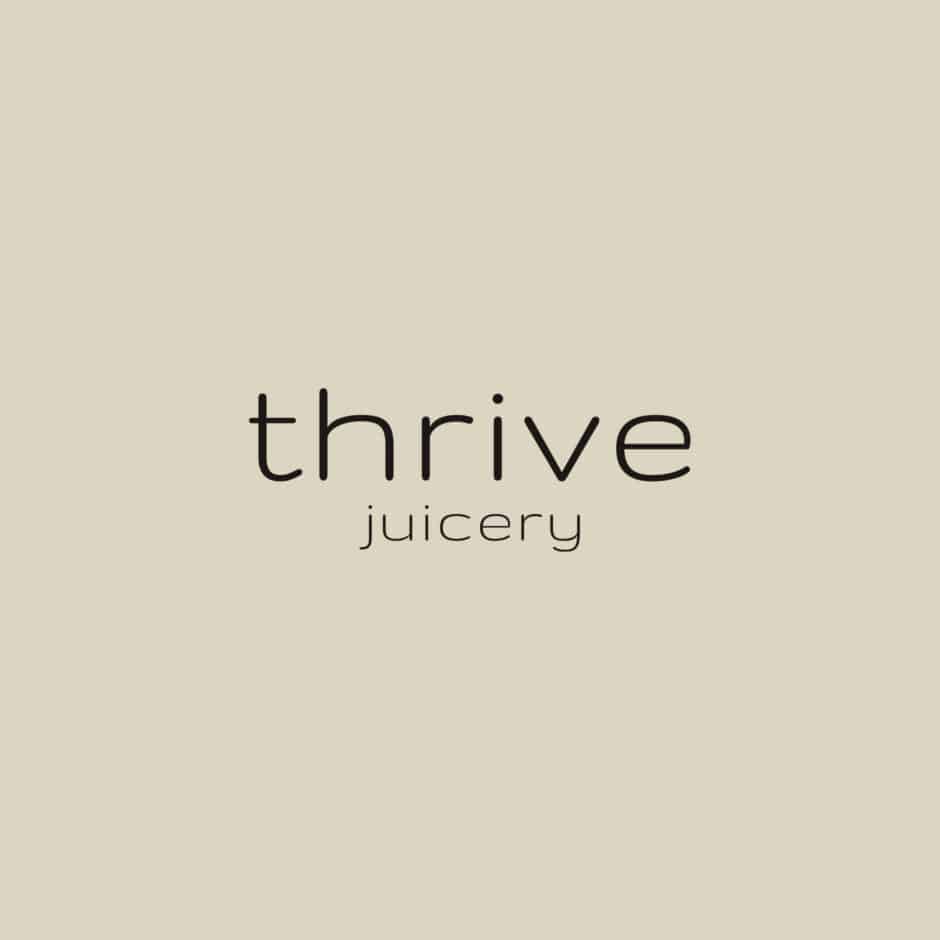 Text logo for "Thrive Juicery" in elegant lowercase font, set on a light beige background, conveying a sense of simplicity and freshness.