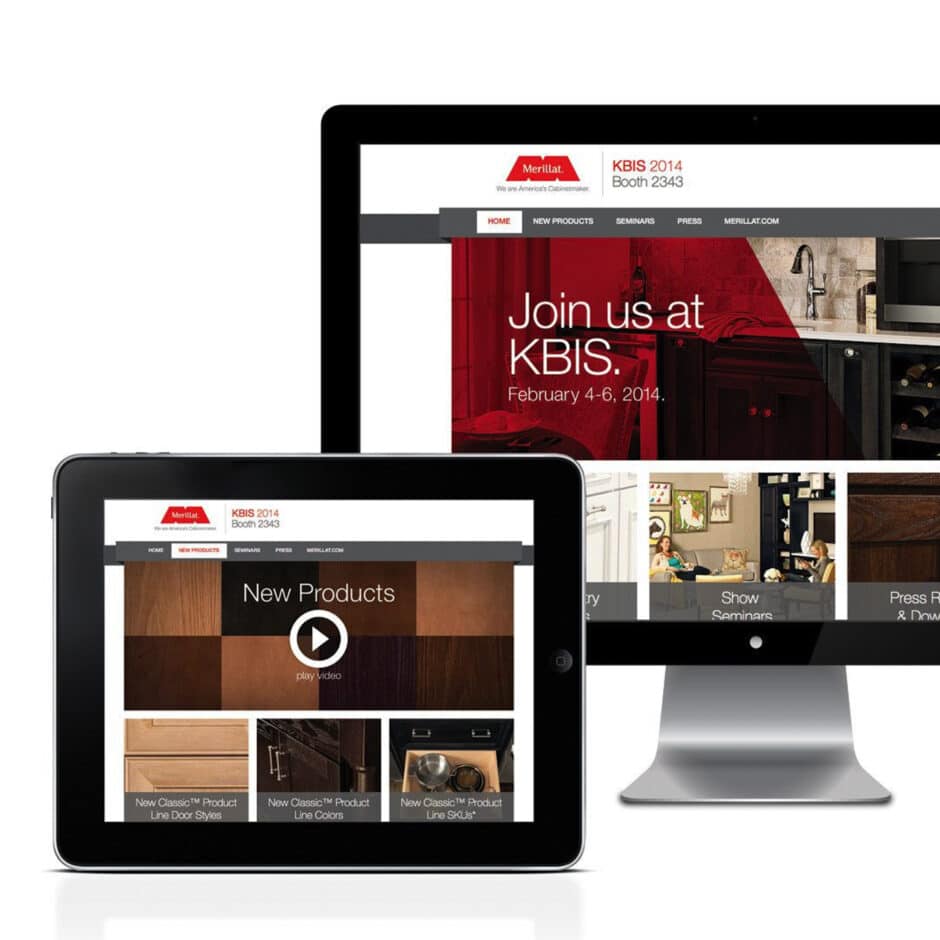 A computer monitor and tablet display a kitchen cabinetry website. The monitor shows an invitation to KBIS, while the tablet highlights new product videos.