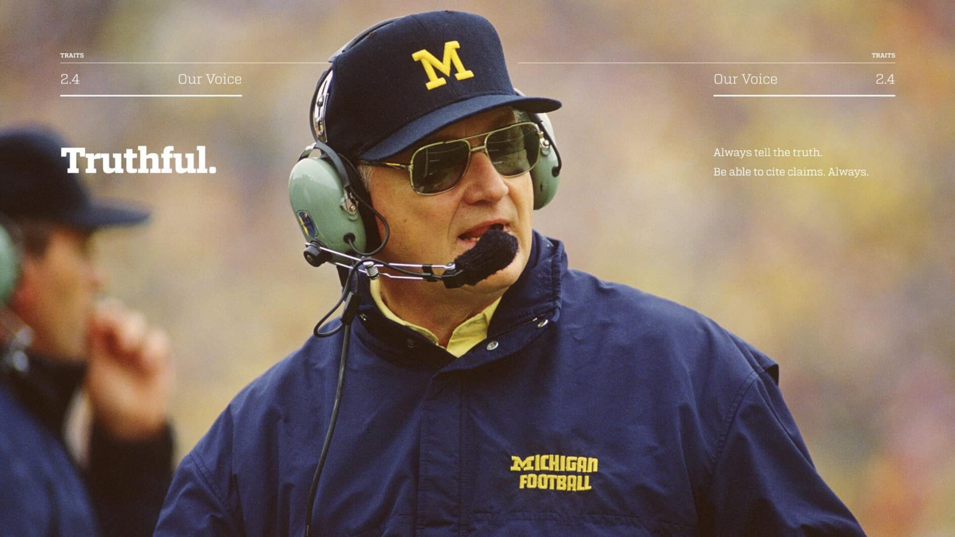 A person wearing a navy Michigan cap and headset stands on a football field. "Truthful" is written on the left, with phrases about honesty on the right.