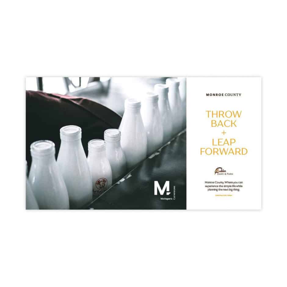 Row of vintage milk bottles on the left, with "MONROE COUNTY" and "THROW BACK + LEAP FORWARD" text on the right, promoting simple living.
