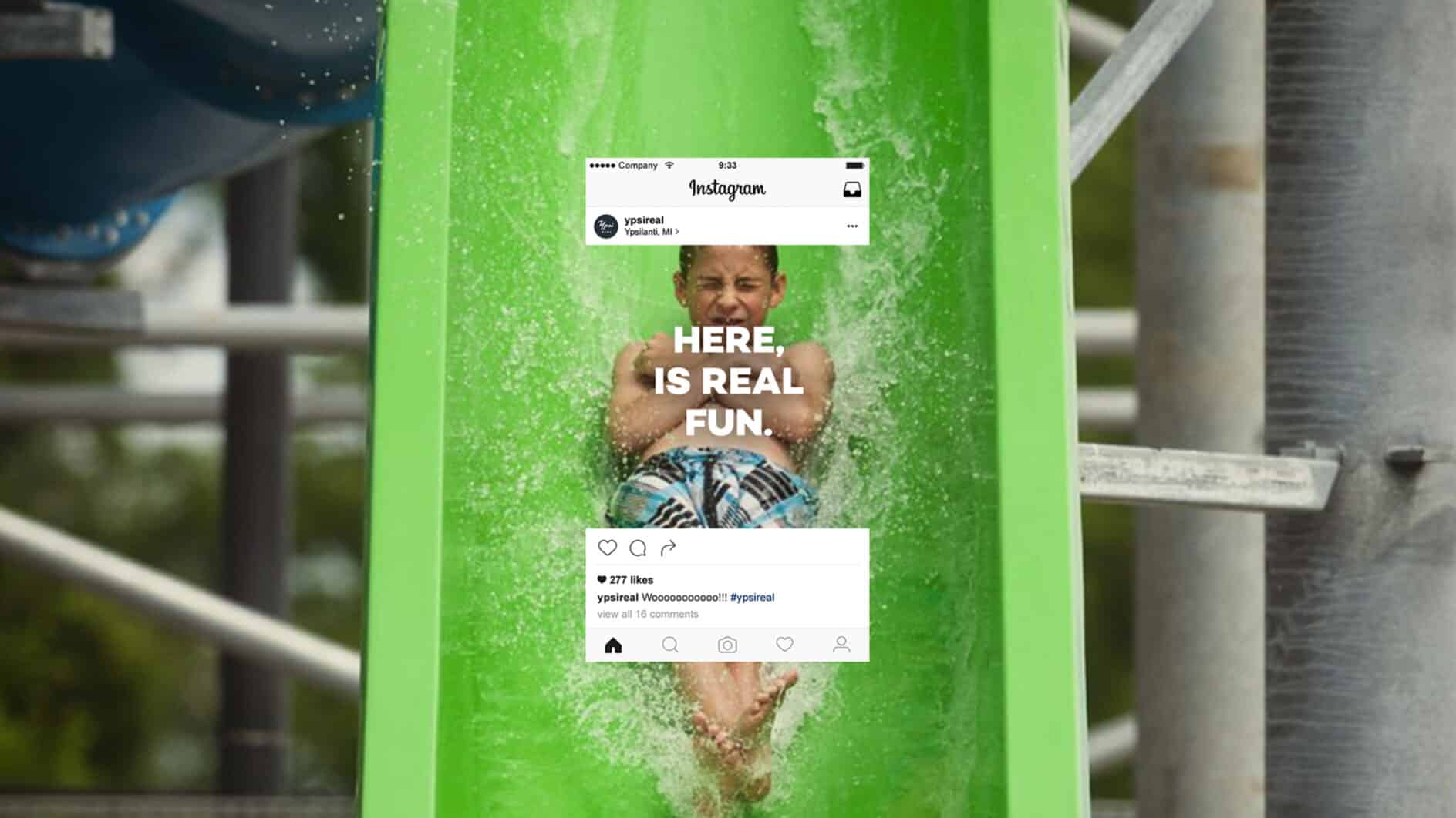 A child joyfully slides down a bright green water slide with splashes surrounding them. Overlaid text reads "Here, is real fun," conveying excitement and adventure.