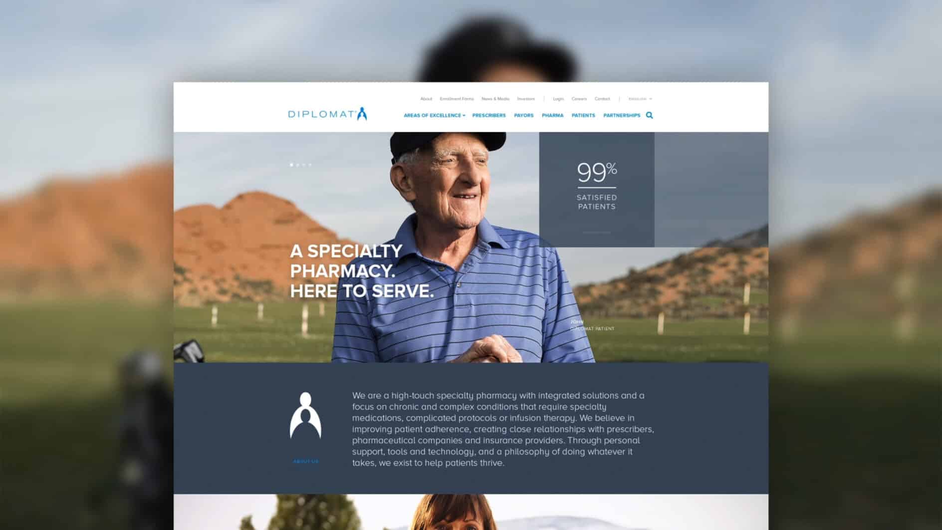 Elderly man wearing a cap and striped polo shirt smiles outdoors, set against a scenic backdrop of hills. Text reads "A Specialty Pharmacy. Here to Serve."