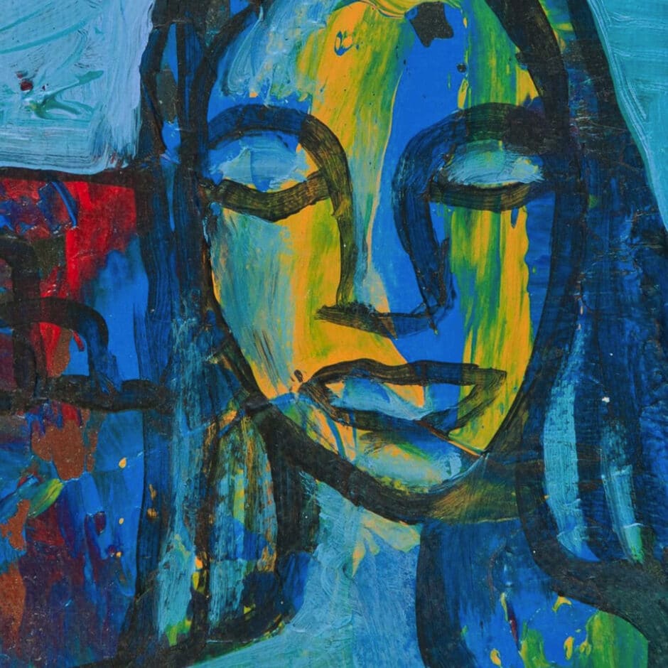 Abstract painting of a face with closed eyes, in vibrant blue, yellow, and green hues. The expression is serene, creating a calming atmosphere.