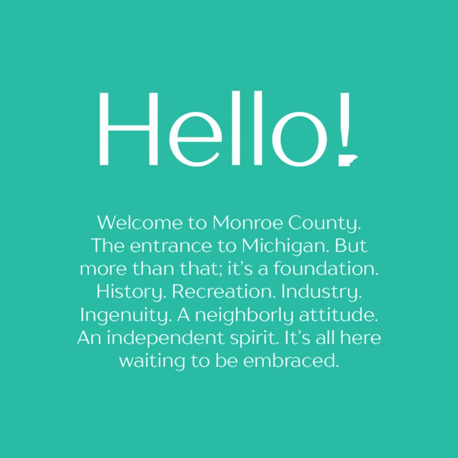 Text on a teal background reads: "Hello! Welcome to Monroe County, the entrance to Michigan. It's a foundation of history, recreation, industry, and ingenuity."