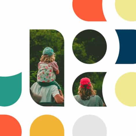 A child wearing a floral shirt and a green cap rides on an adult's shoulders, surrounded by colorful geometric shapes on a white background.