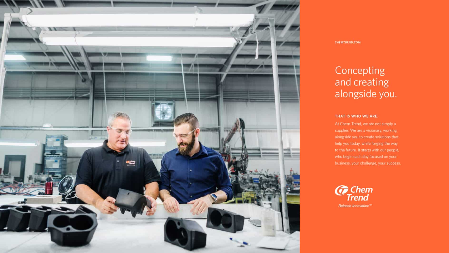 Two men examine industrial parts in a well-lit manufacturing facility. The scene conveys collaboration and innovation, with text about Chem Trend's values on the side.