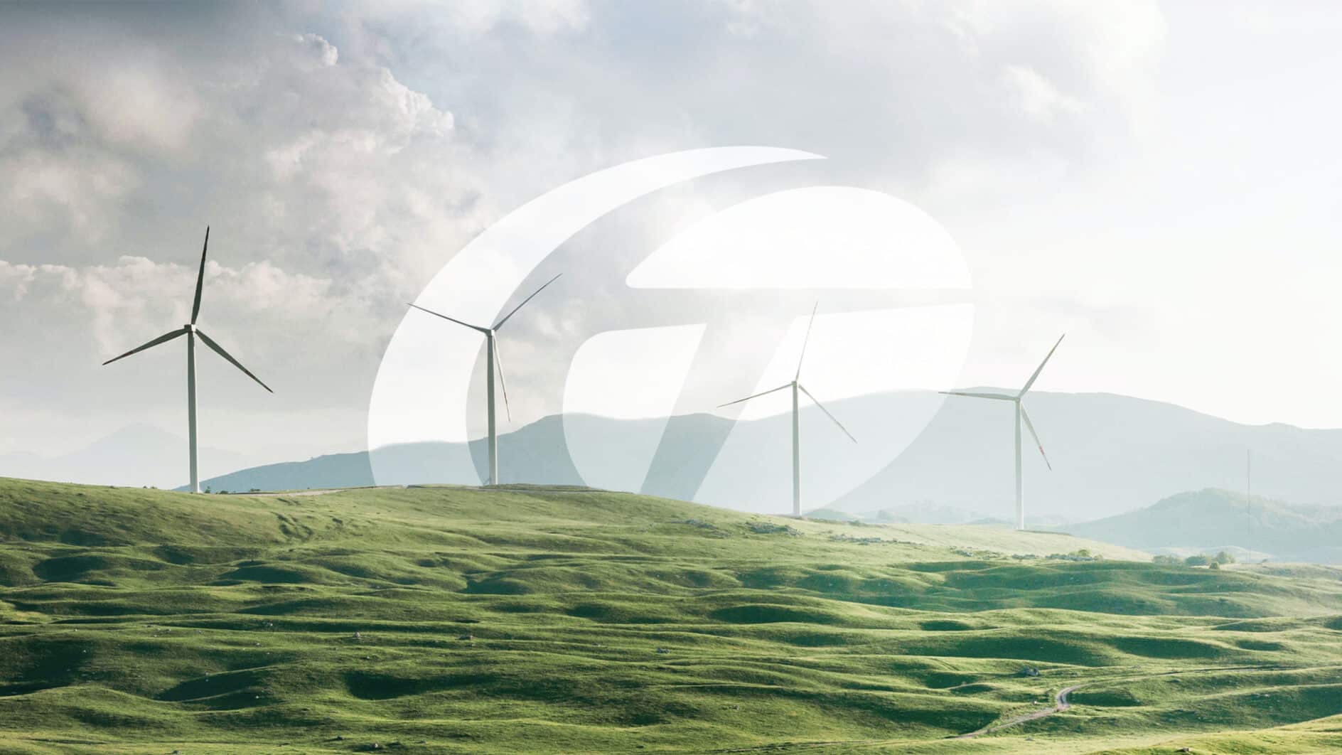 A serene landscape with five wind turbines on green rolling hills under a partly cloudy sky. The scene conveys a sense of calm and sustainable energy.