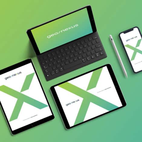 Digital devices on a gradient green background show the geo/nexus logo on screens. Includes a tablet with keyboard, stylus, two tablets, and a smartphone.