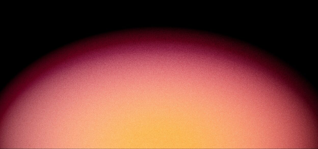 A vibrant gradient forms a semi-circle at the bottom, shifting from deep red to bright yellow, set against a black background, evoking a sense of tranquility.