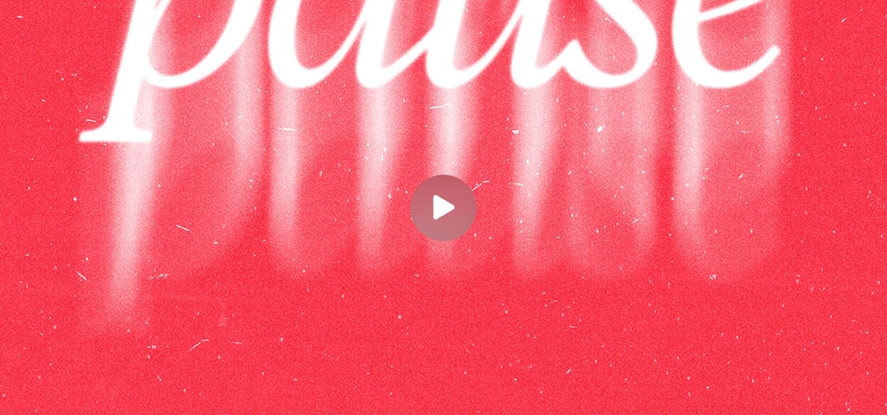 The word "pause" in white cursive letters appears with a bright blur effect on a textured red background, with a play button overlay in the center.