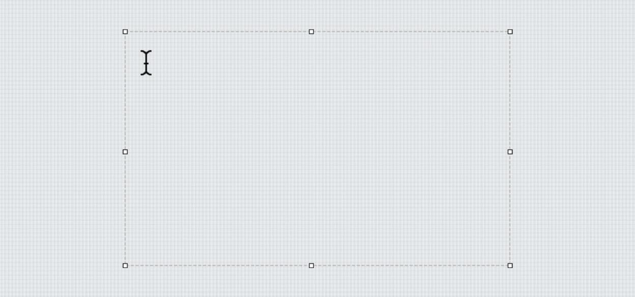 Empty graph paper background with a large, outlined rectangular selection and a text cursor at the top left, suggesting a ready-to-type area.