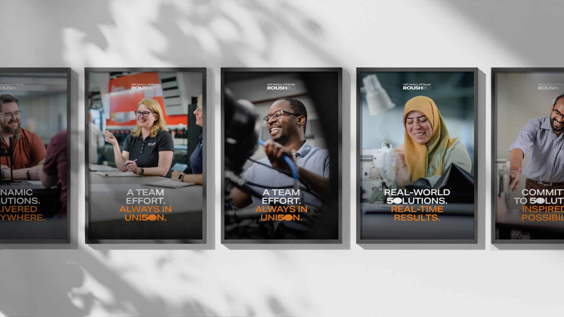 A series of five framed posters on a wall showcasing diverse individuals engaged in teamwork, with motivational phrases in bold text. The tone is positive and collaborative.