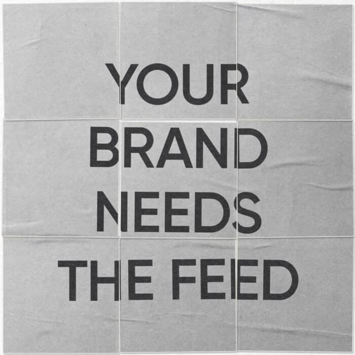 Text "YOUR BRAND NEEDS THE FEED" is displayed in bold black letters on a textured gray background, suggesting an emphasis on marketing.