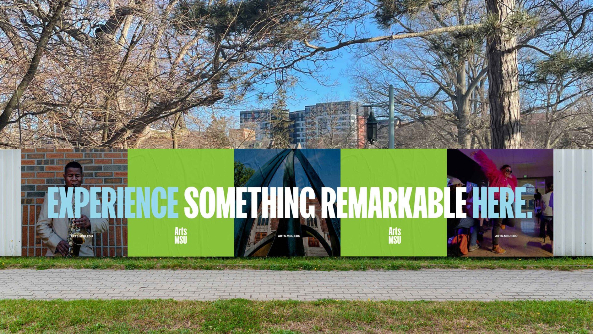 Outdoor ad with "Experience Something Remarkable Here" in bold text over images of a saxophonist, an arts building, and a gallery.